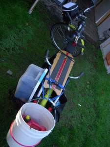 gallon of gas in a bucket on xtracycle